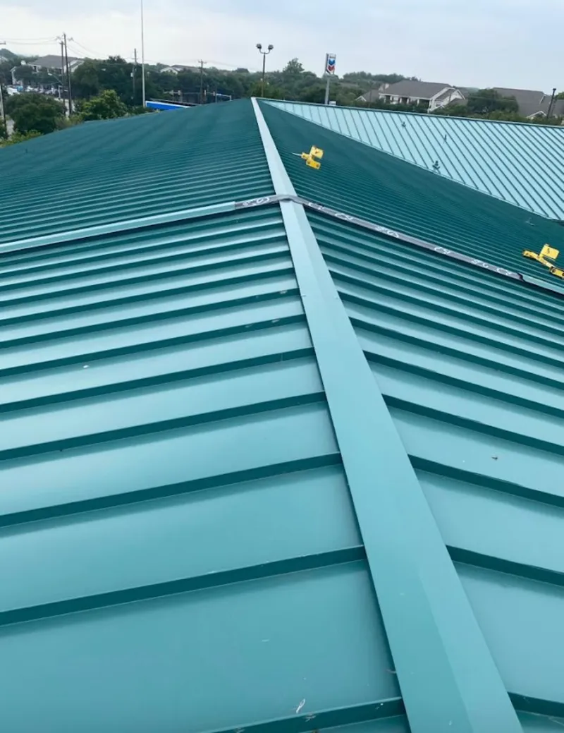 Green commercial metal roof ridge and valley for Metal Roof Repair in San Dimas