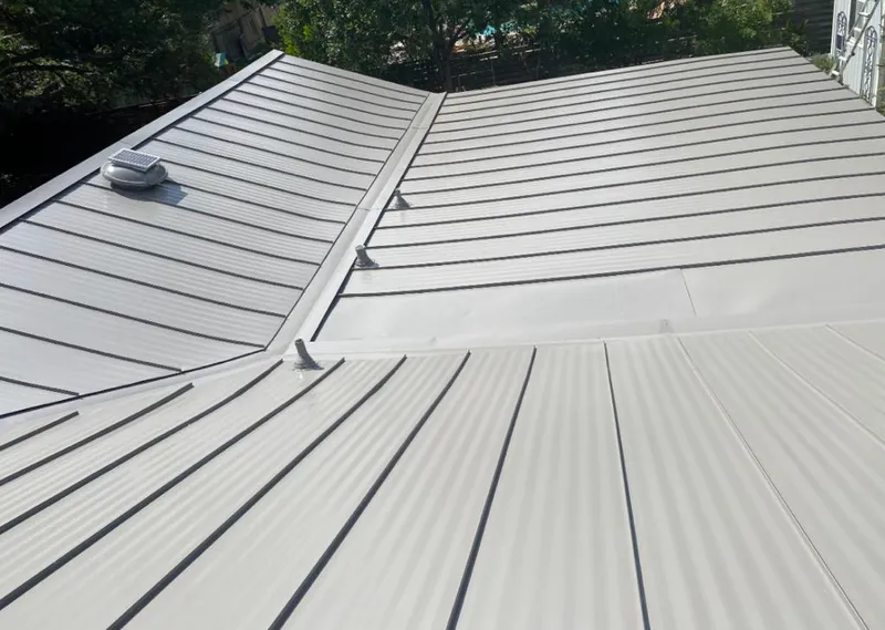 Solar attic fan installed on a metal roof for Roof Ventilation in San Dimas